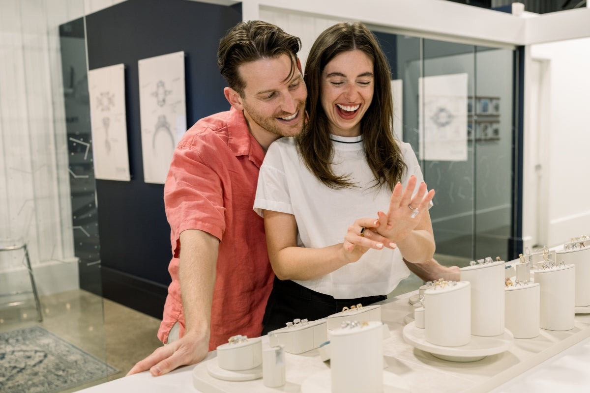 Soha Diamond Co. Couple Browsing Showroom Discover the Benefits of Visiting Soha Diamond Co.'s Showroom Blog Post Engagement Ring Jeweler in Madison, Wisconsin