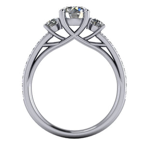 Three stone engagement ring from a side view
