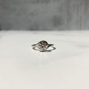 Bypass style engagement ring white gold