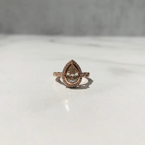 Infinity inspired bezel set engagement ring