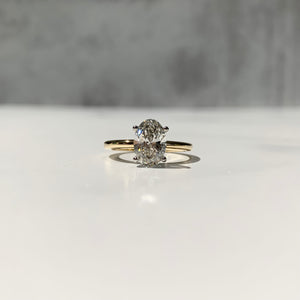 Yellow gold and platinum solitaire ring