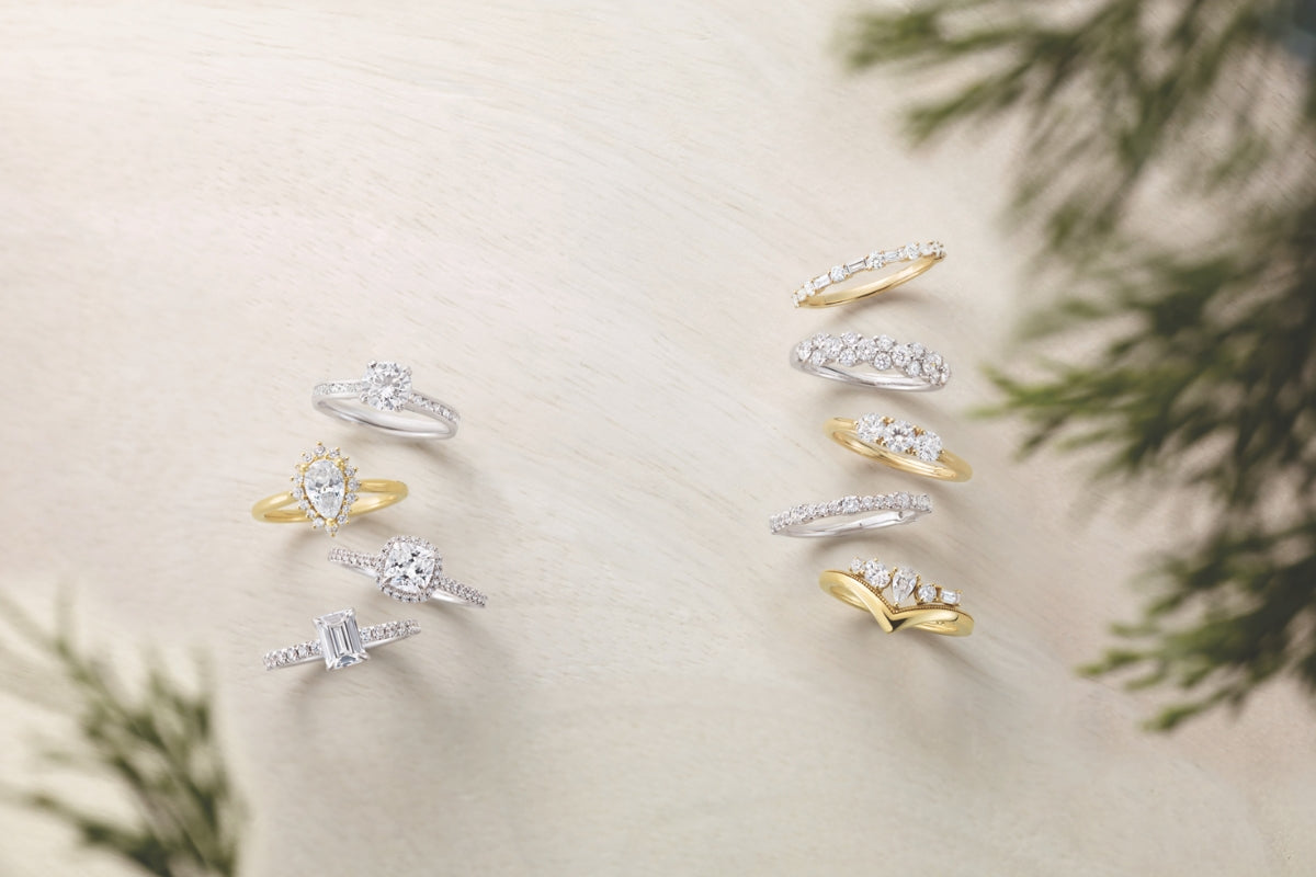 Wedding Bands and Engagement Rings on cream background Blog Post by Soha Diamond Co. in Fitchburg, Wisconsin