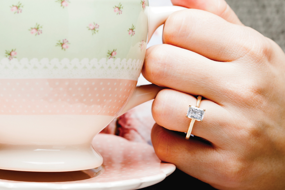 solitaire engagement ring vs three stone engagement ring blog post by Soha Diamond Co. Jewelry Store in Madison, WI