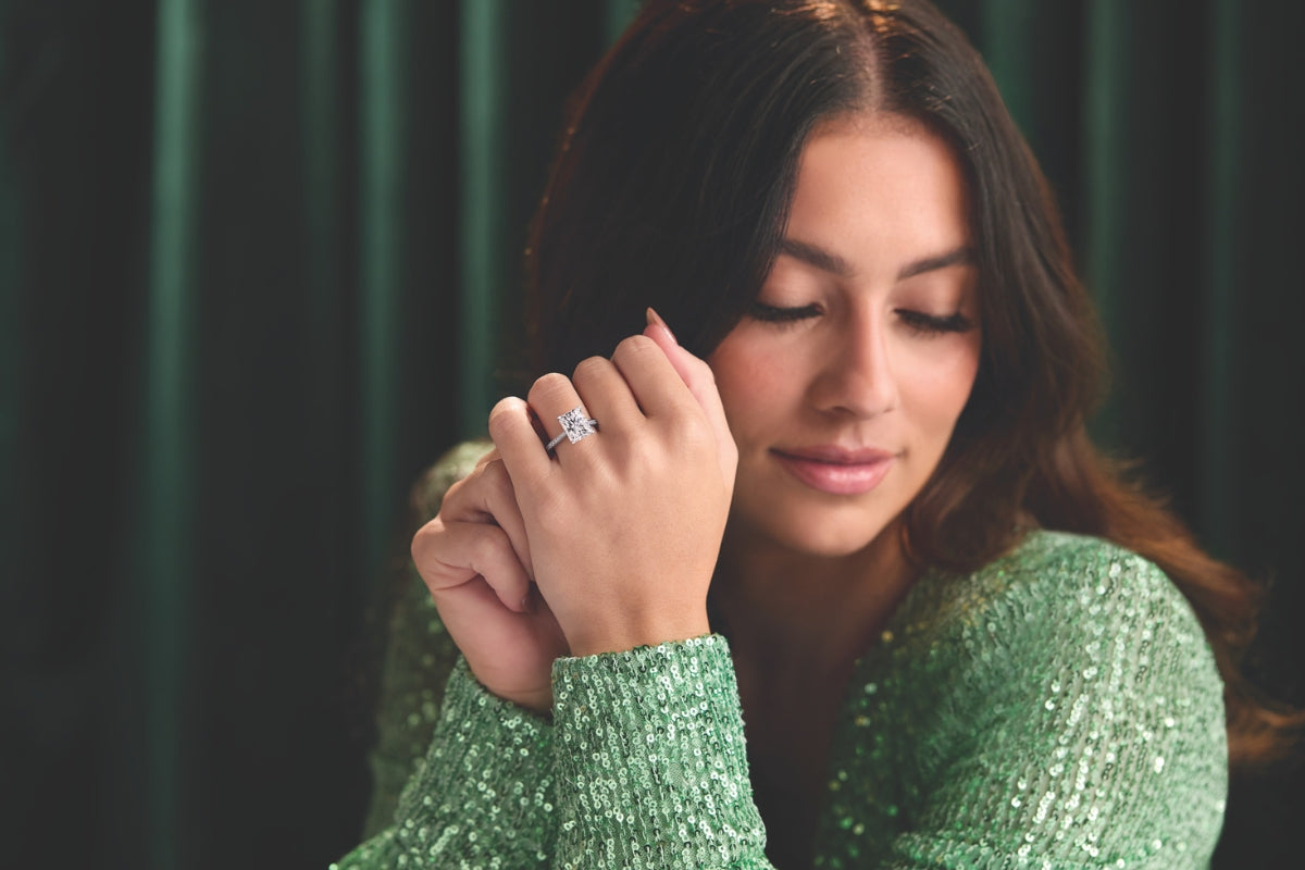 Women Wearing Engagement Ring Green Sweater Which Hand Do You Wear Your Engagement Ring On Blog Post Lab-Grown Diamond Engagement Rings by Soha Diamond Co. in Madison, Wisconsin