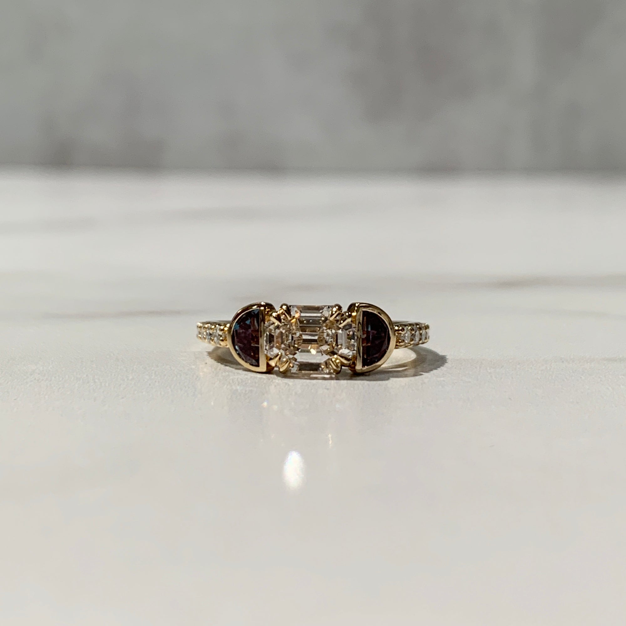 Three-Stone engagement ring with half moon alexandrite gemstones
