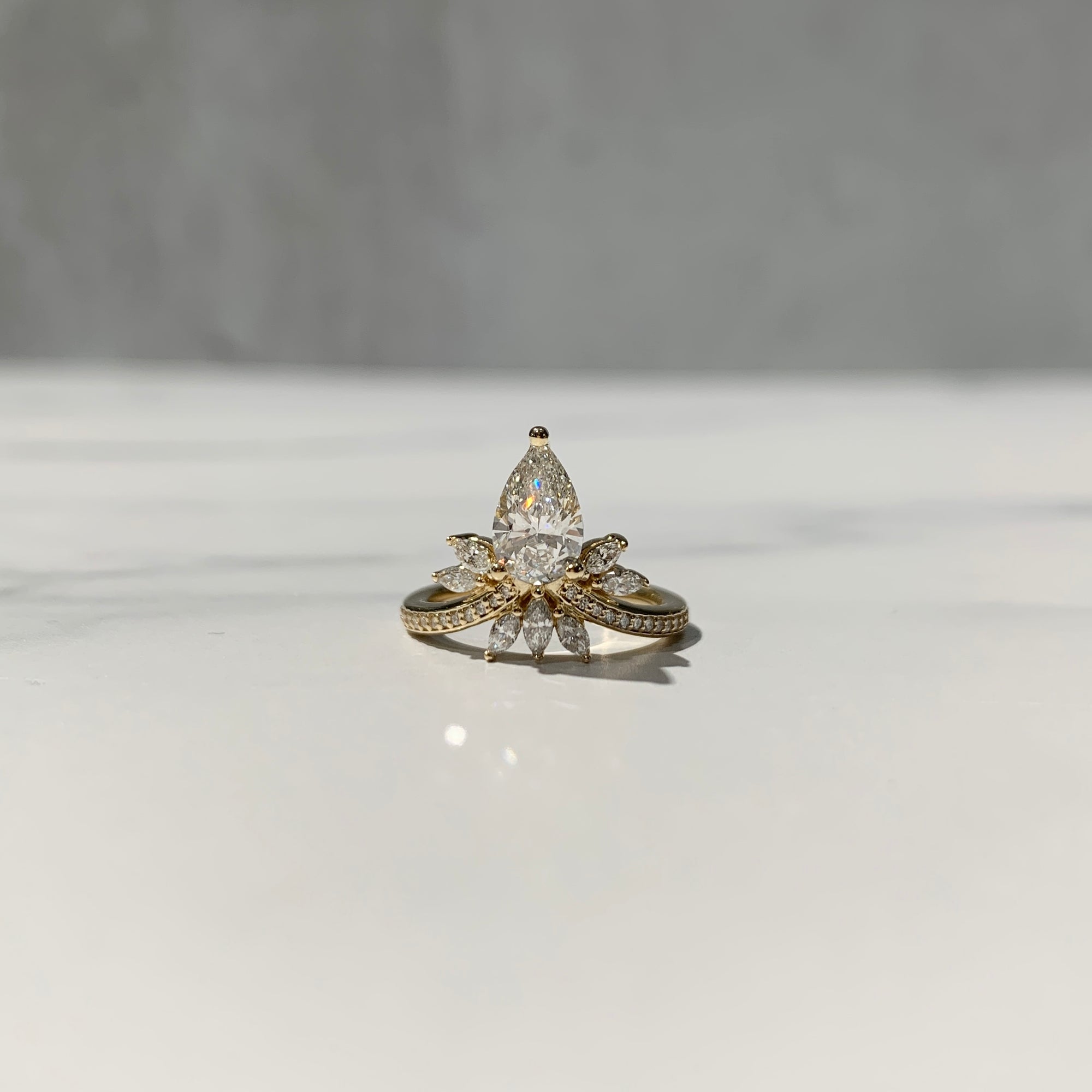 V shaped vintage inspired pear engagement ring