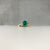 Blue moissanite engagement ring in yellow gold