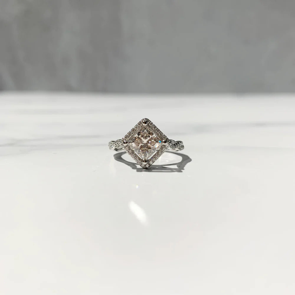 Compass style princess cut diamond halo engagement ring