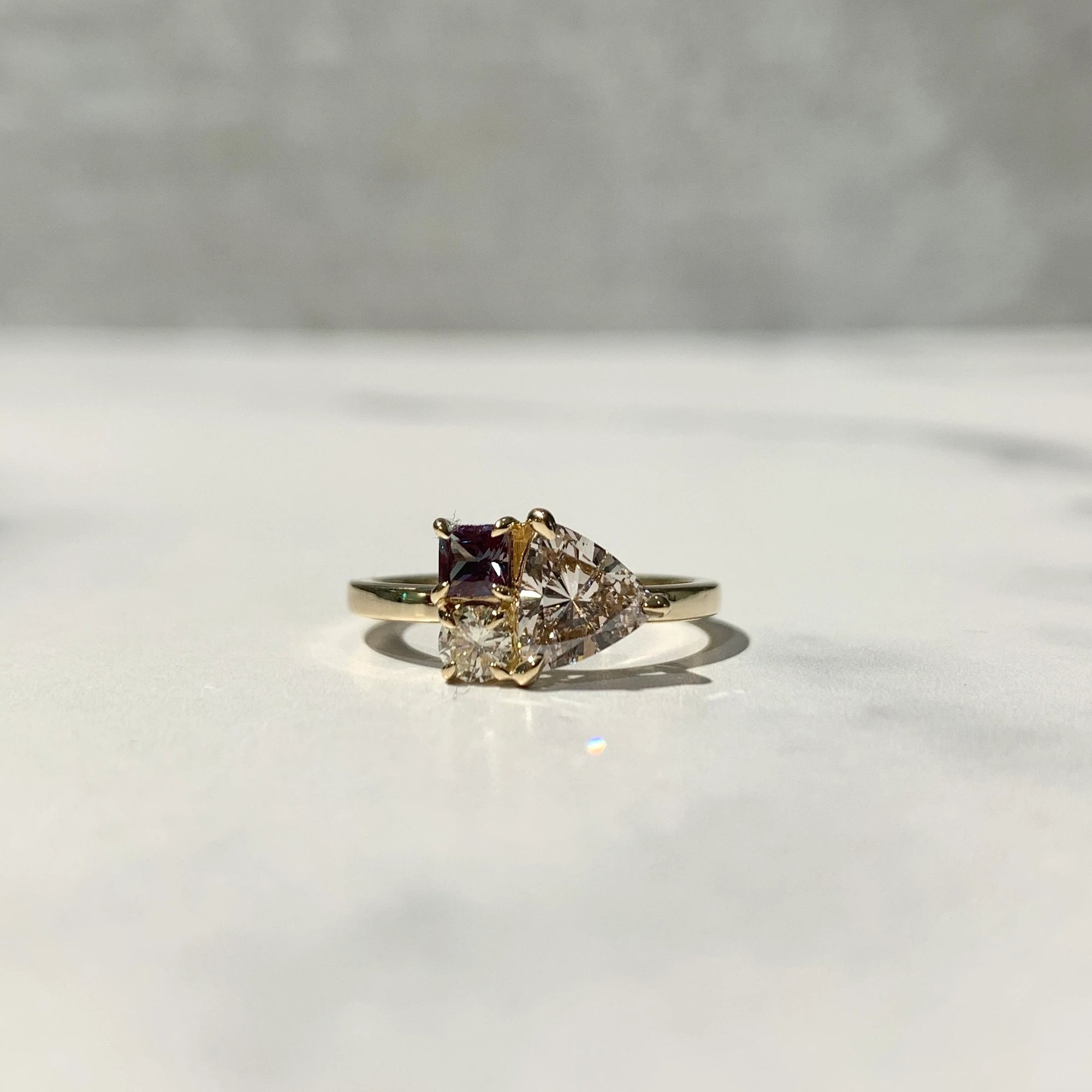 yellow gold cluster ring with square alexandrite