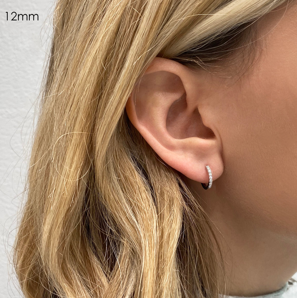 12 mm lab-grown diamond hoop earring  on ear