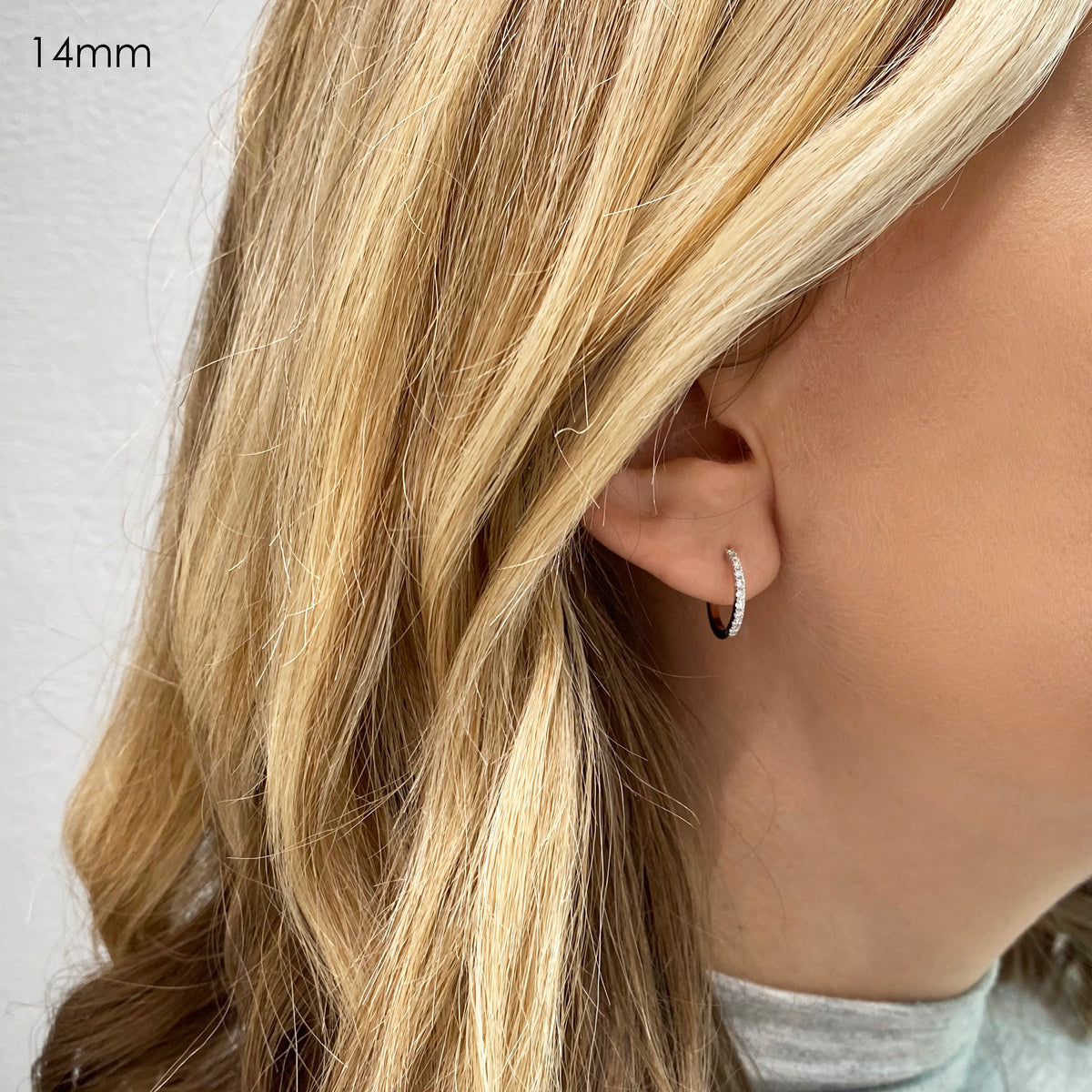 14 mm lab-grown diamond hoop earring  on ear