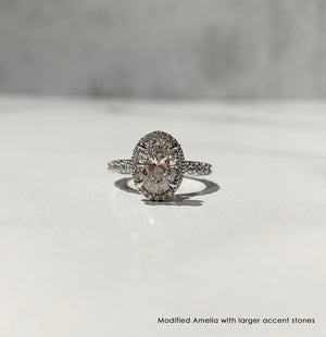 Oval Halo Engagement Ring with claw prongs