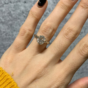 Chicago engagement ring with oval moissanite center stone