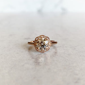 Vintage inspired halo engagement ring with beading