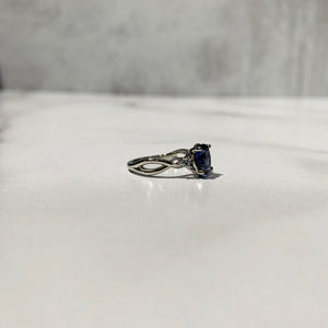 Greta engagement ring with blue sapphire and aqua spinel