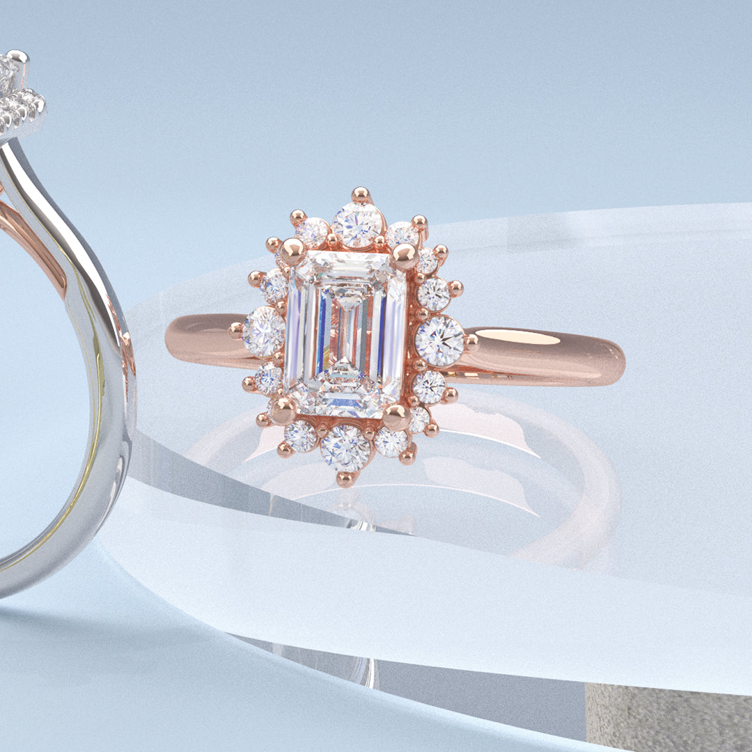 Halo engagement ring with emerald cut diamond