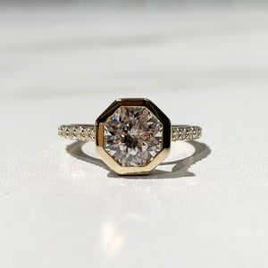Bezel set octagon diamond engagement ring