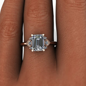 art deco inspired engagement ring emerald cut