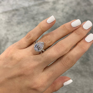 Pear french-set halo on hand