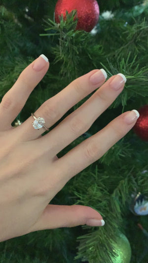 Four prong solitaire on hand christmas proposal