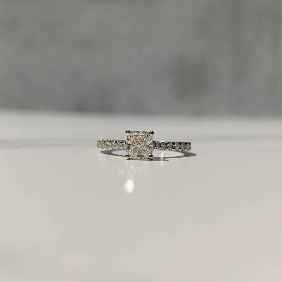 French-set cathedral solitaire with cushion diamond