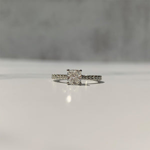 French-set cathedral solitaire with cushion diamond