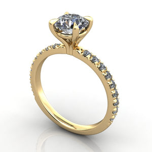 french set solitaire with claw prongs yellow gold
