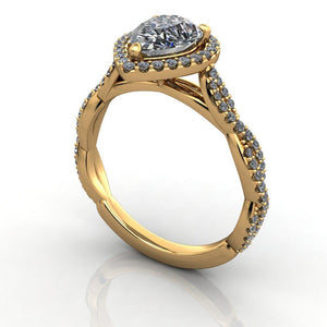 Pear halo engagement ring yellow gold