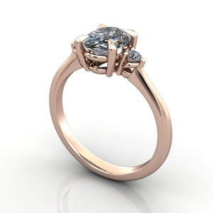 Petite three stone engagement ring rose gold