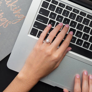 Pear halo engagement ring rose gold