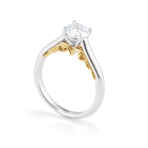 Sculptural engagement ring two tone metal