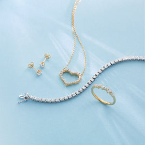 Lab grown diamond heart necklace with tennis bracelet, stud earrings, scattered ring